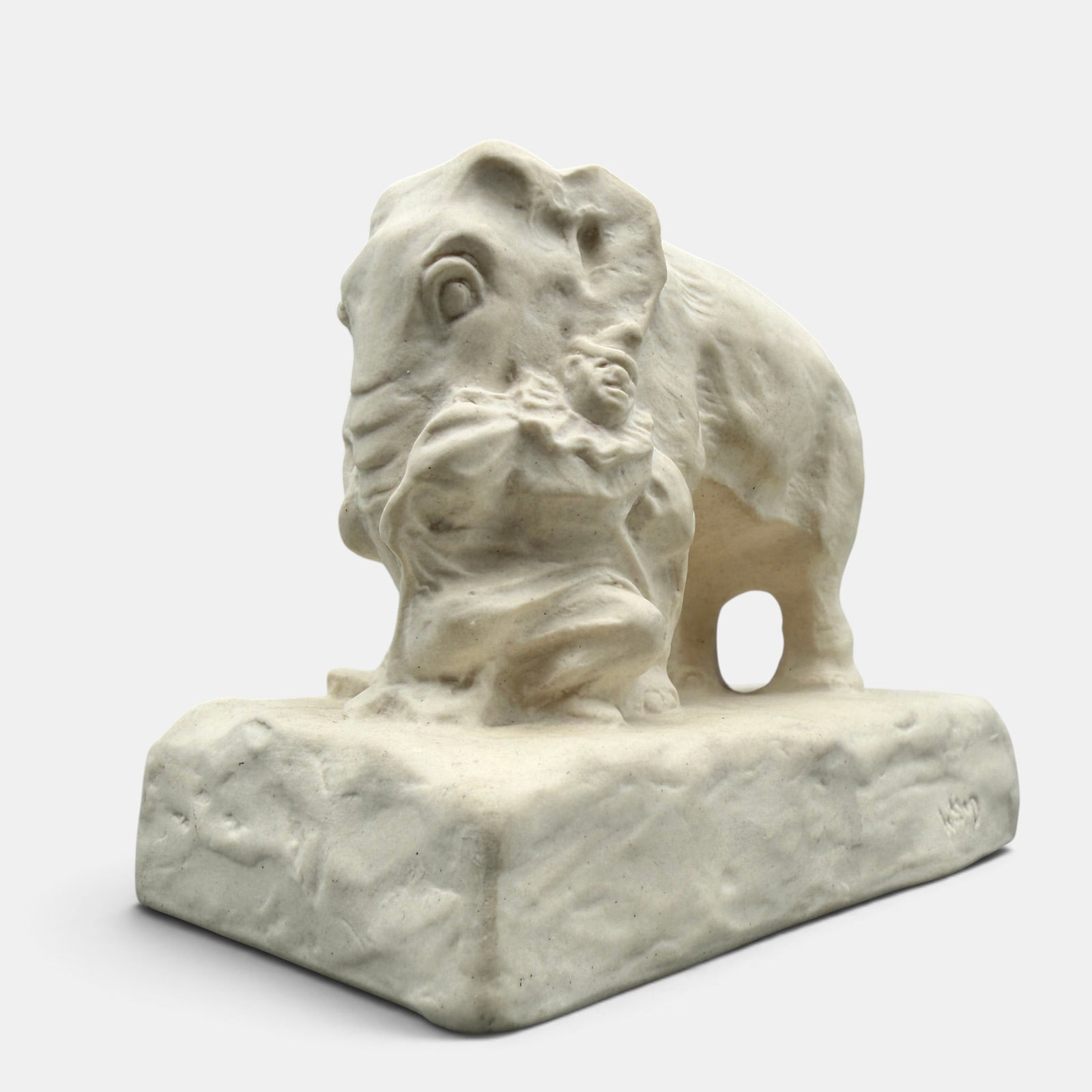 Rookwood unglazed elephant paperweight, 1922.: Rookwood unglazed elephant with clowns paperweight, a William McDonald design, done in 1922. Impressed Rookwood logo, XXII Shape number 2628, WmPMcD on plinth. Height 3 1/2 inches.