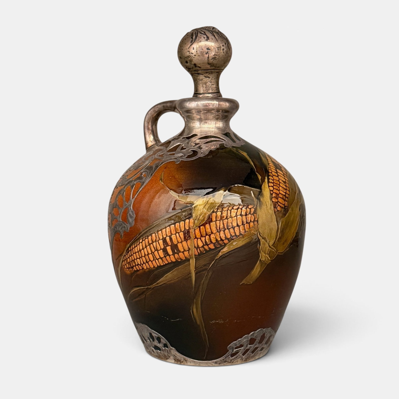 Fine Rookwood silver overlay whiskey jug, ARV, 1892.: Fine Rookwood Standard glaze vase with beautifully painted ears of corn by Albert Valentien and elaborate silver overlay by Gorham. A nice addition is a Sterling stopper with embossed ear of corn, mos
