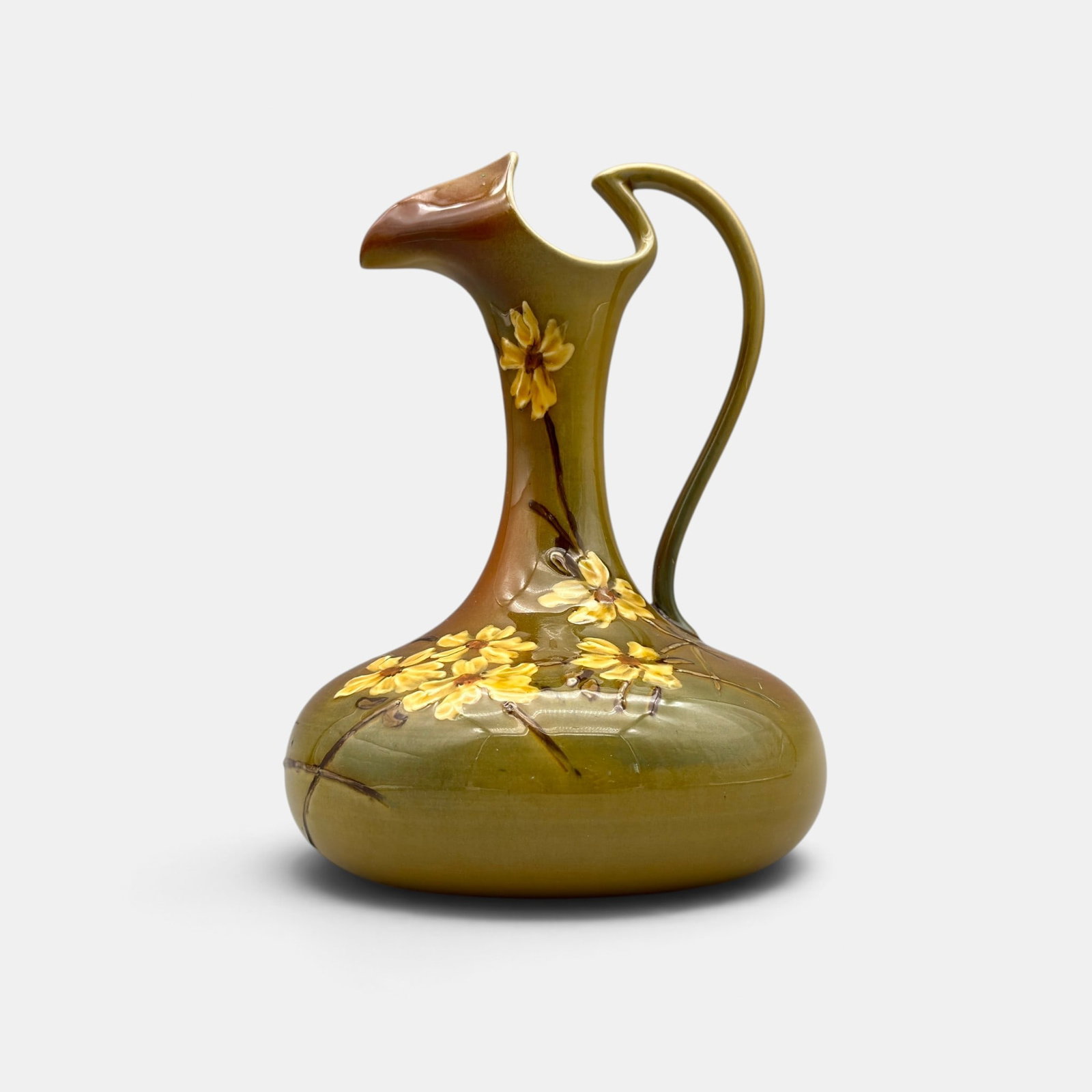 Rookwood Standard ewer, floral, Perkins, 1888.: Rookwood Standard glaze were with delicate yellow flowers done by Luella Perkins in 1888. Impressed Rookwood logo with two flames, Shape number 433, S for sage green clay. Incised MLP/L for artist