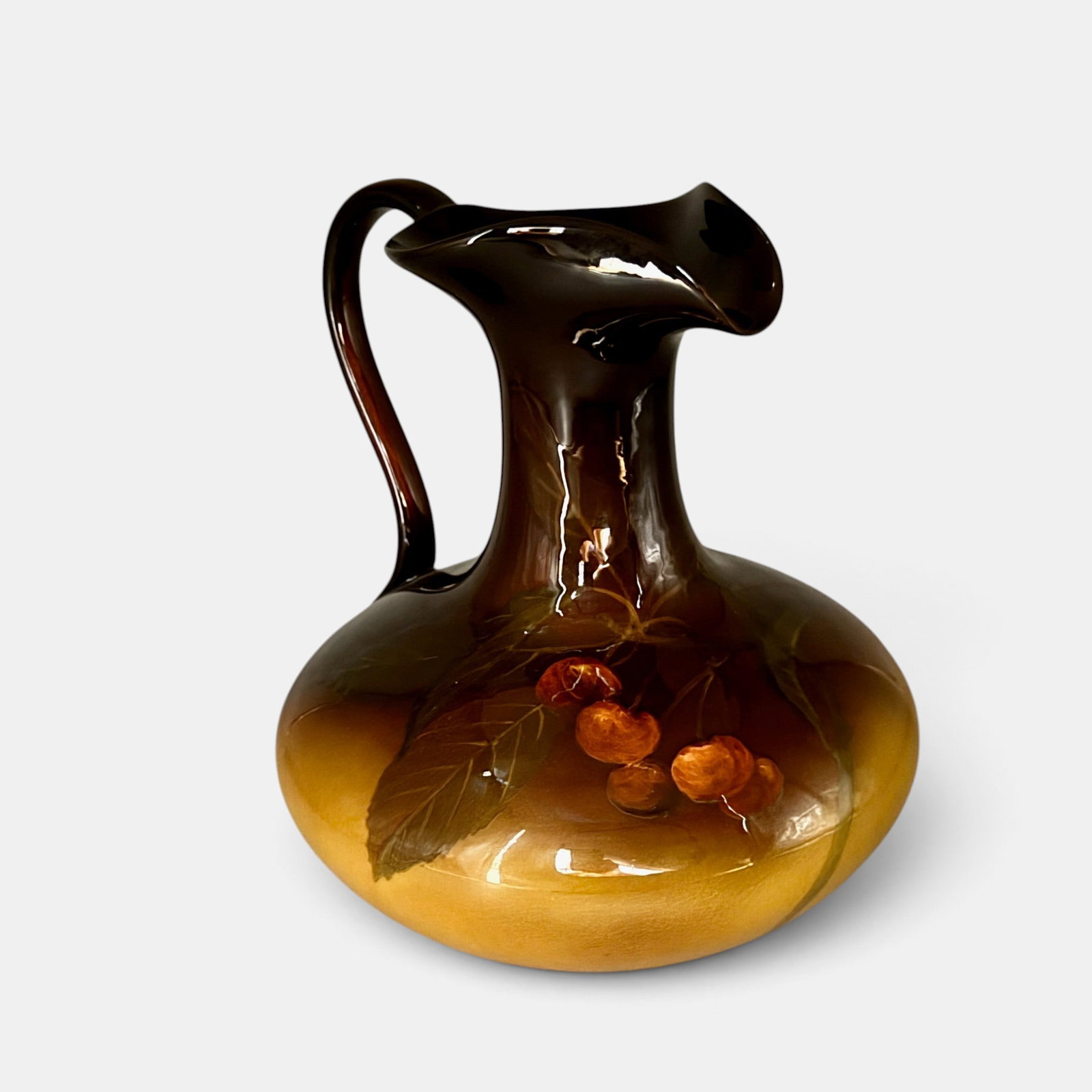 Rookwood Standard ewer, cherries, AMV, 1899.: Hefth Rookwood Standard glaze ewer with red cherry decoration done in 1899 by Anna Valentien. Impressed Rookwood logo with 13 flames, Shape number 495 A. incised AMV. Height 9 1/2 inches.