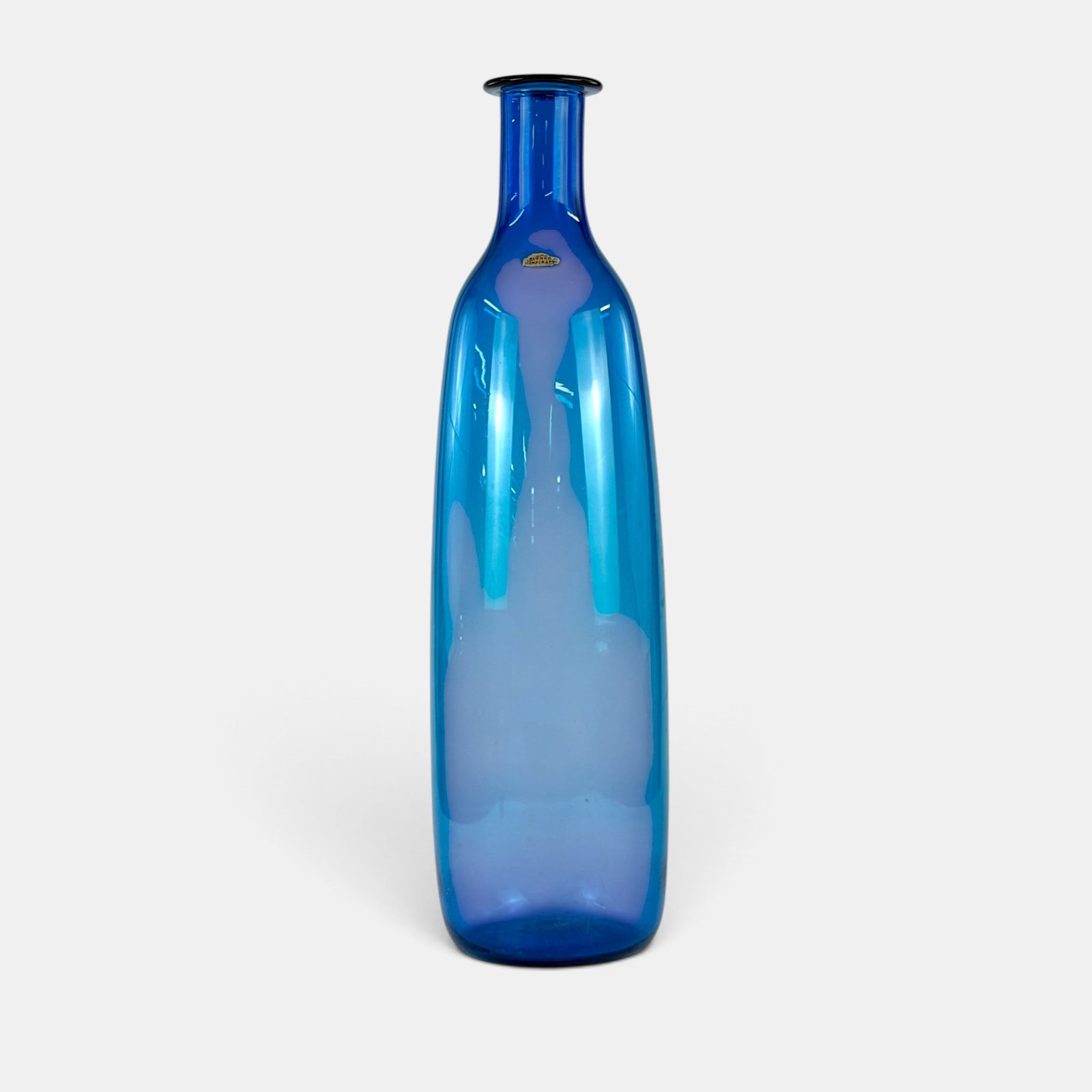 Large blue Blenko blown bottle, 28 1/4 inches.: Large Blenko Handcraft bottle in blue glass. Original Blenko label. Height 28 1/4 inches.