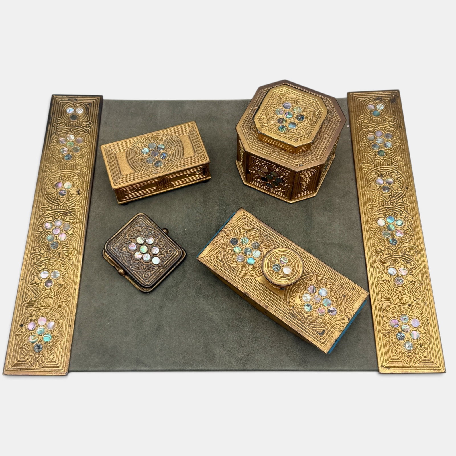 Tiffany Studios Abalone Desk Set: 6 total pieces, each marked Tiffany Studios, New York, with MOP inlay to each. Including the calendar holders, inkwell, clip, box with insert, and blotter.