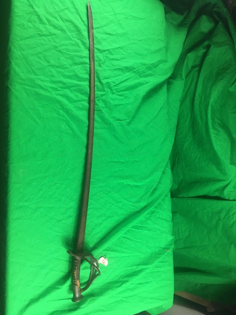 Antique model 1840 sword cavarly civil war ?: cavalry sword , wood handle is broken sword is 38.5" long. handle has A floral pattern