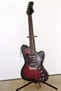 Vintage Silvertone Solid Body Electric Guitar: Comes with the stand. Needs a lot of love.