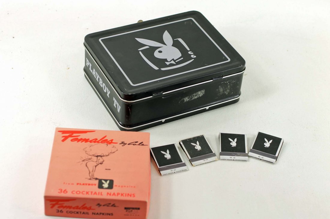 Lot of Playboy Items: Includes metal lunchbox, Playboy cocktail napkins Females by Cole, and 4 matchbooks from Playboy clubs in Los Angeles, CA, Sandiego, CA, Osaka, Japan, and Nassau, Bahamas