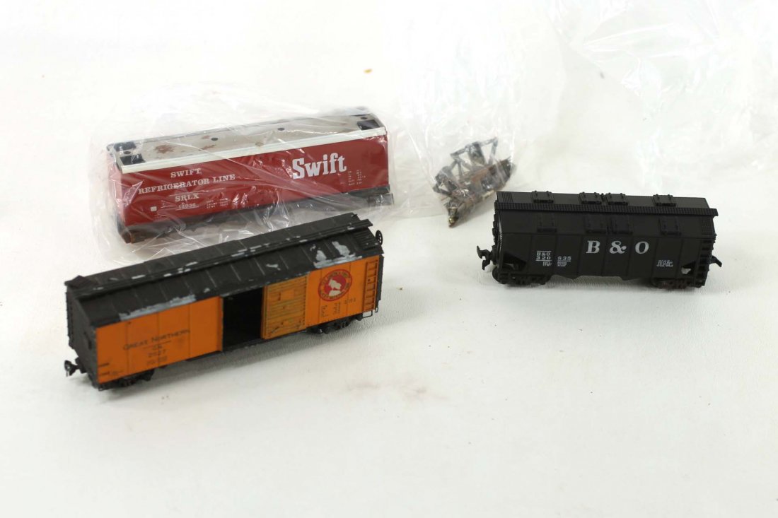 Lot of HO Scale Train Cars: The Swift one appears to be partially finished and is missing wheels. Includes only what you see in the pictures.