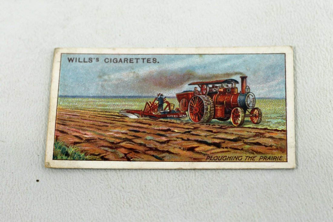 Ploughing the Prairie Tobacco Card: Ploughing the Prairie Tobacco Card No 46 in the Overseas Dominions Canada series from Wills's Cigarettes. Features a steam engine tractor plowing a field
