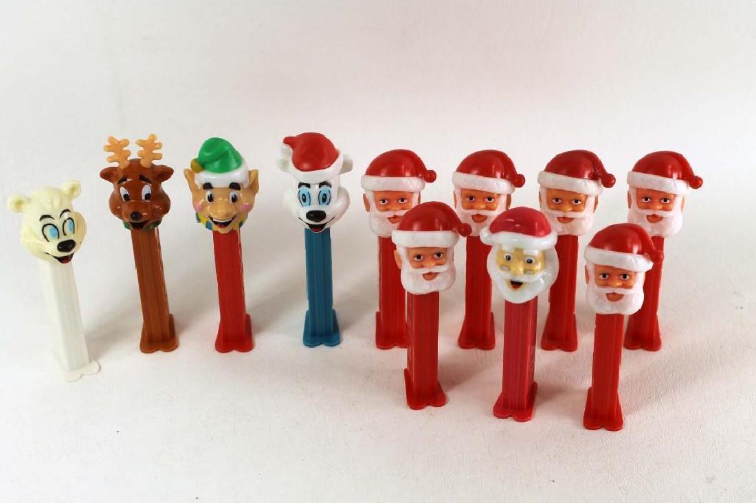 Lot of 11 Christmas Pez Dispensers: Includes Santa Clauses , reindeer , polar bears , elf