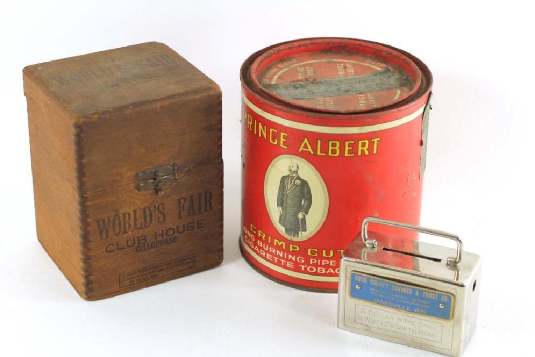 World's Fair Cigar Box, Prince Albert Can, and a Rock: Lot which includes World's Fair Cigar Box, Prince Albert Can, and a Rock County Bank