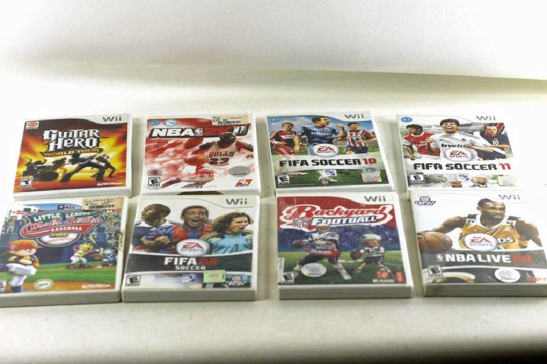 Lot of Nintendo Wii Games: Includes Guitar Hero World Tour, NBA 2K 11, Fifa Soccer 10, Fifa Soccer 11, Little League World Series Baseball 2008, Fifa 08 Soccer, Backyard NFL Football, and NBA Live 08