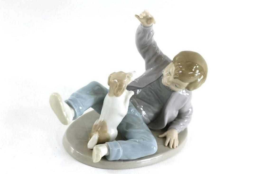 lladro figurines boy with dog
