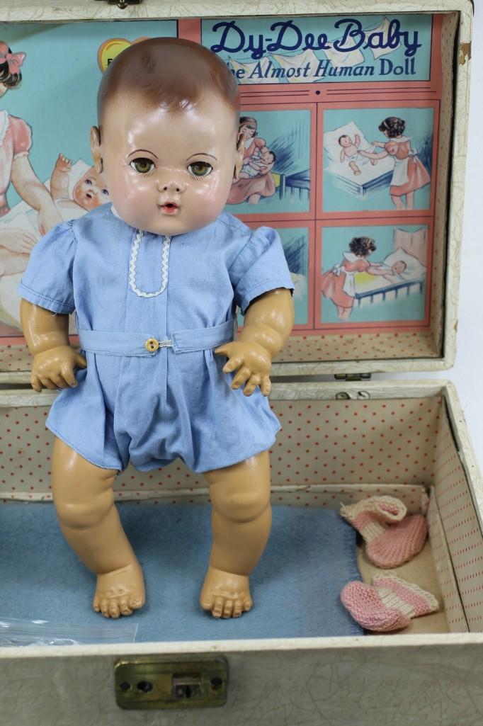 1940's Effanbee Dy-Dee Baby w/ original Case and Dy-Dee: 1940's Effanbee Dy-Dee Baby w/ original Case and Dy-Dee Diary This doll isn't scary, so you should bid on it.