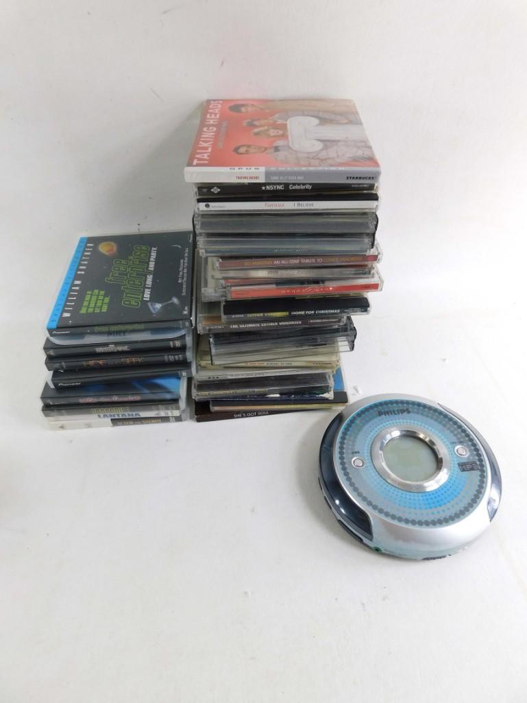 Lot of CDs, DVD's and a CD / MP3 Player (1 of 3)