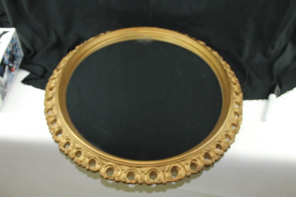 Decorative Oval Mirror: Decorative Oval Mirror Roughly 24" x 20" at the longest and shortest parts.