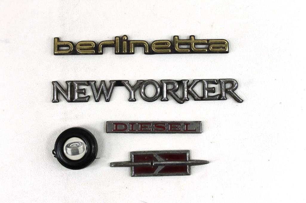 Lot of car emblems: Lot of car emblems Includes New Yorker, Berlinetta, Diesel, Olds, etc.