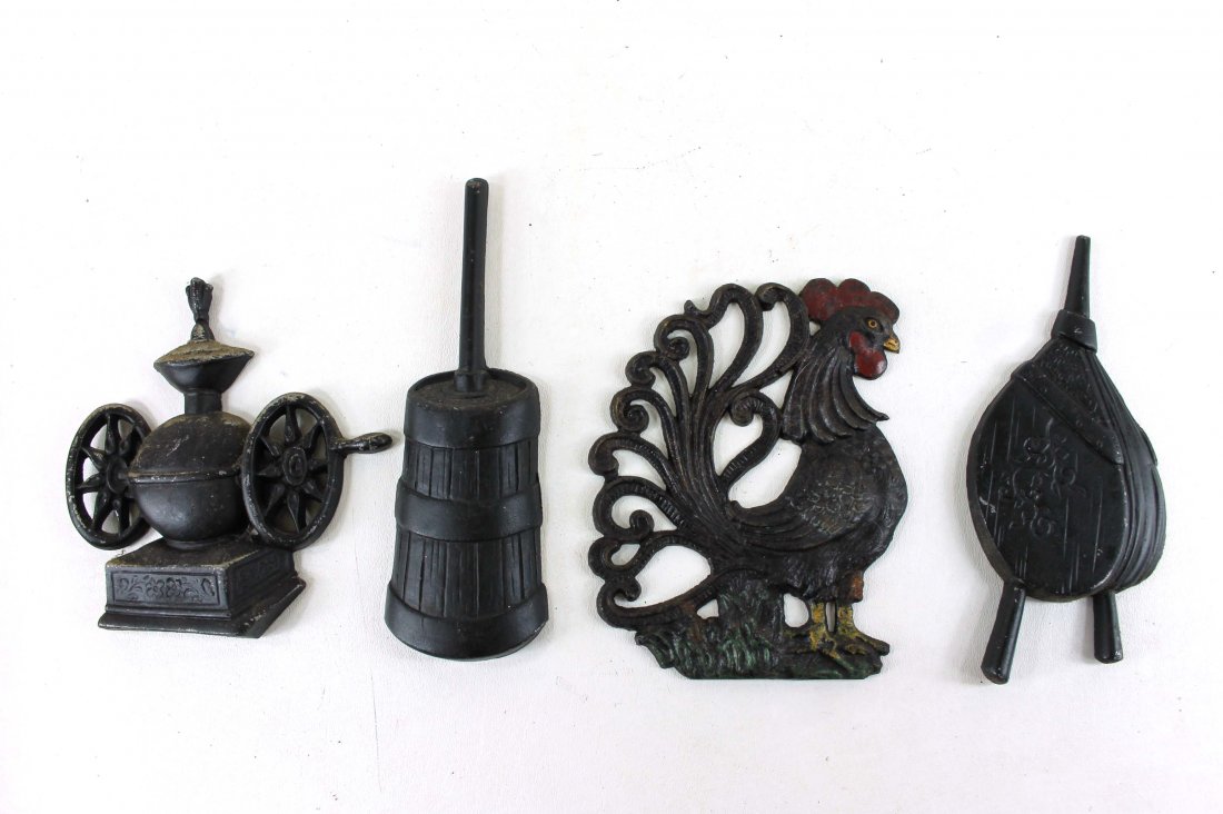 Lot of 4 Cast Iron Wall Hangings: Lot of 4 Cast Iron Wall Hangings Butter Churn, Rooster, Bellows, etc. The butter Churn is roughly 8.5" tall from bottom to top