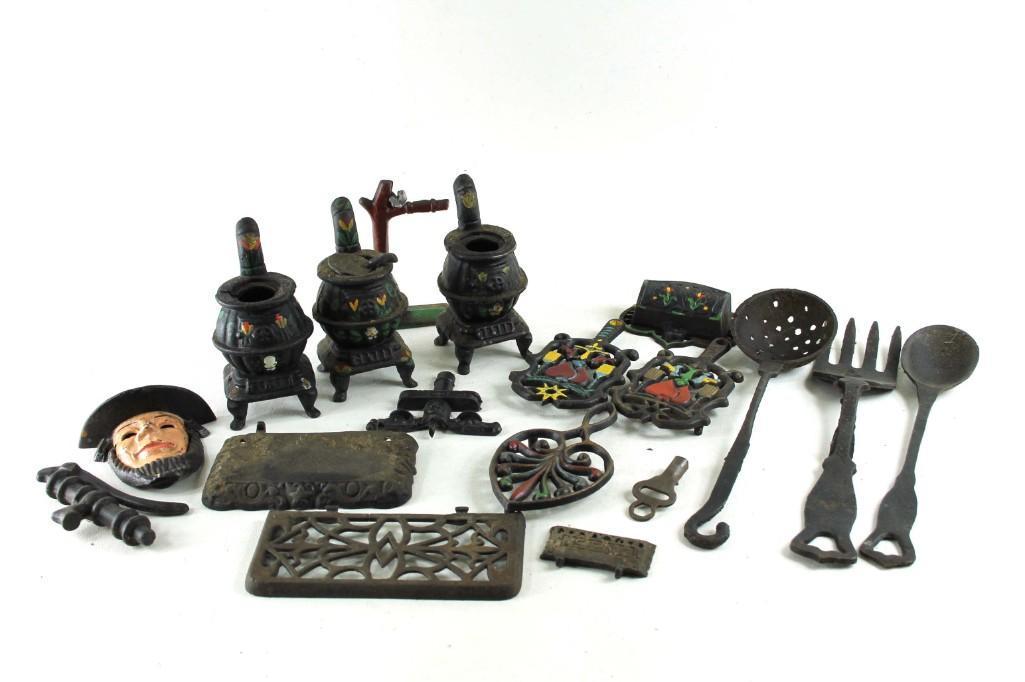 Cast Iron Lot - Amish head, mini stoves, utensils, etc.: Cast Iron Lot - Amish head, mini stoves, utensils, etc.