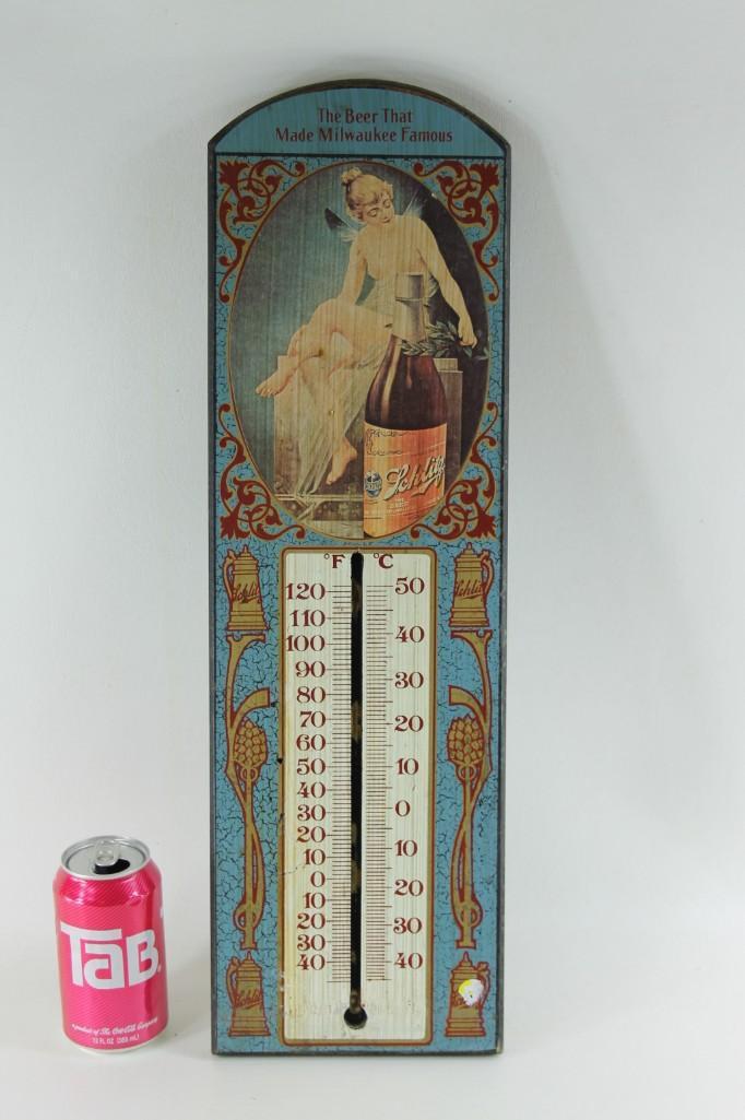 Vintage Schlitz Advertising Thermometer: Vintage Schlitz Advertising Thermometer "The beer that made Milwaukee famous" Condition: Unfortunately the glass thermometer part is missing, but it still looks pretty cool