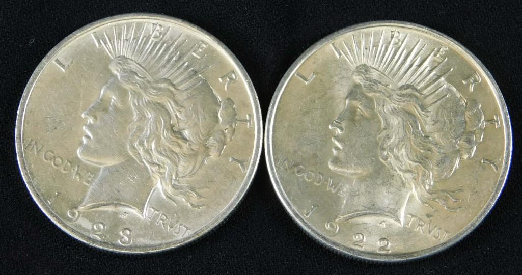 1922-P Peace Dollar and a 1923-P Peace Dollar: Lot of 2 Silver Peace Dollars including a 1922 P Peace Dollar and a 1923 P Peace Dollar Collectible coins in nice condition