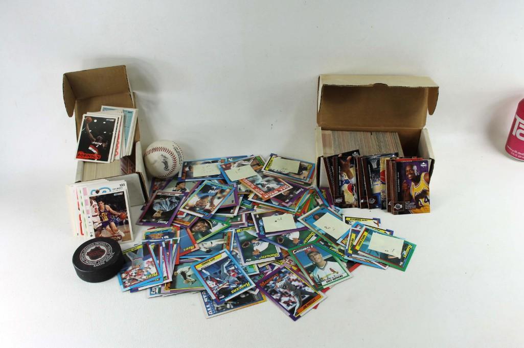 Lot of Sports Cards , a Hockey Puck , and a Baseball: Sports Lot incl Sports Cards , a Hockey Puck , and a Baseball
