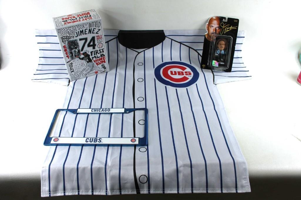 Sports Lot incl a Chicago Cubs Flag in the Shape of a: Sports Lot incl a Chicago Cubs Flag in the Shape of a Shirt , a Chicago Cubs license plate holder, Jesse Ventura Action Figure, etc PLEASE NOTE: THIS IS NOT AN ACTUAL SHIRT BUT A FLAG OR BANNER