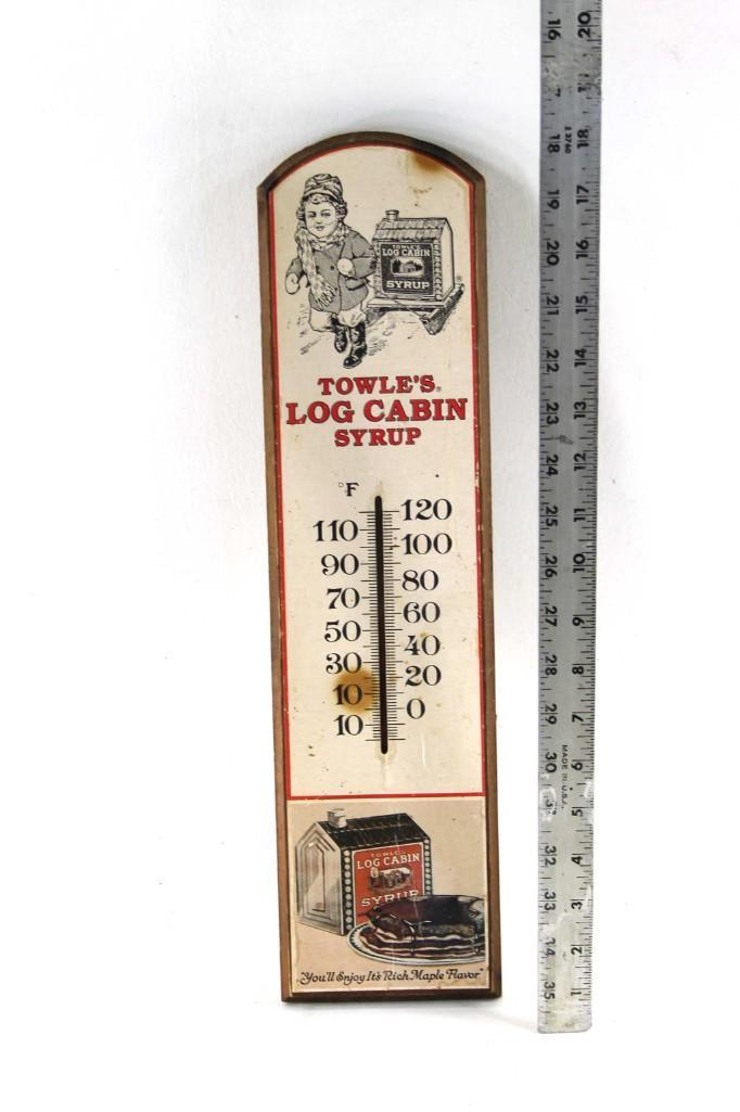 Towle's Log Cabin Syrup Sign: Towle's Log Cabin Syrup sign. This had a thermometer at one point, but the thermometer is missing Condition: Thermometer is missing