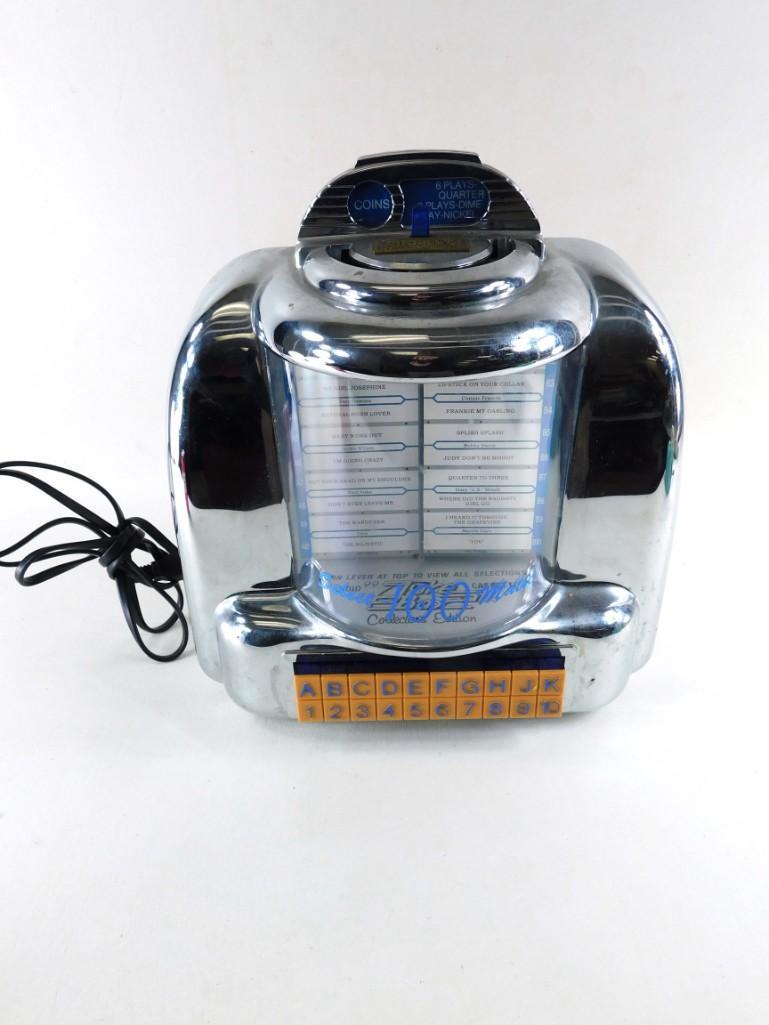 Crosley AM FM Radio Cassette Player: Crosley Collector's Edition Model CR-10 AM FM Radio Cassette Player that looks like a diner jukebox (obviously it's not a jukebox, it just looks like one).