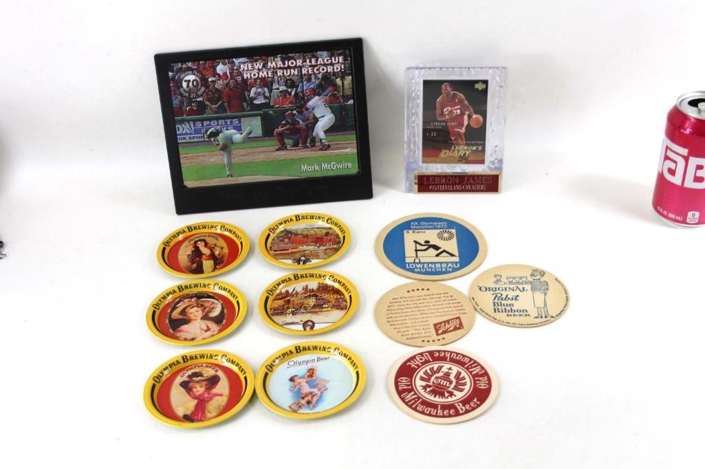 Lot of Beer Coasters and a Sports Memorabilia: Including a Lebron James plaque, a Mark Mcgwire picture, Lowenbrau coaster, Pabst Blue Ribbon coaster, Schlitz coaster, set of Olympia Beer metal coasters, etc