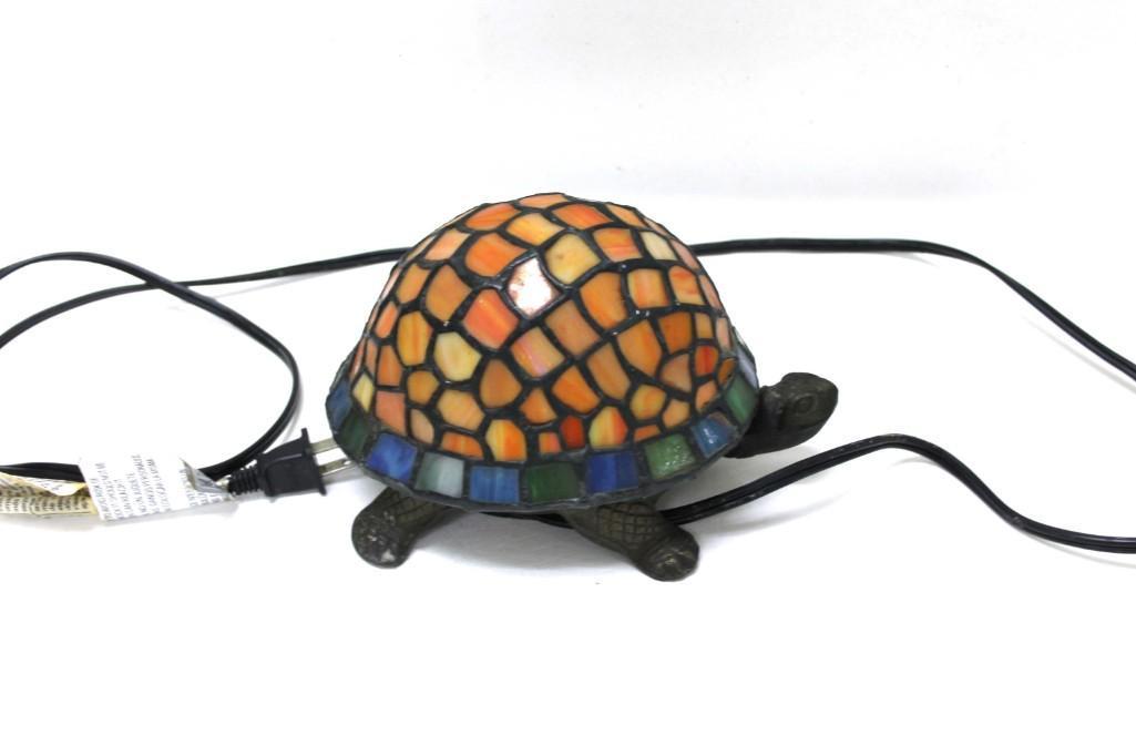 Stained Glass Turtle Lamp: Stained Glass Turtle Lamp , DOES NOT WORK. This will need to have a new light fixture installed inside of it before it can be used as a lamp.