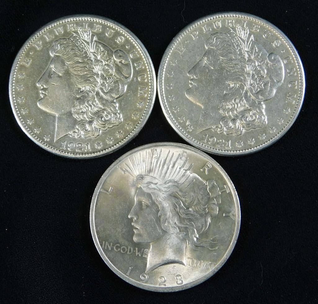 Pair of 1921-S Morgan Dollars and a 1923-P Peace Dollar (1 of 2)