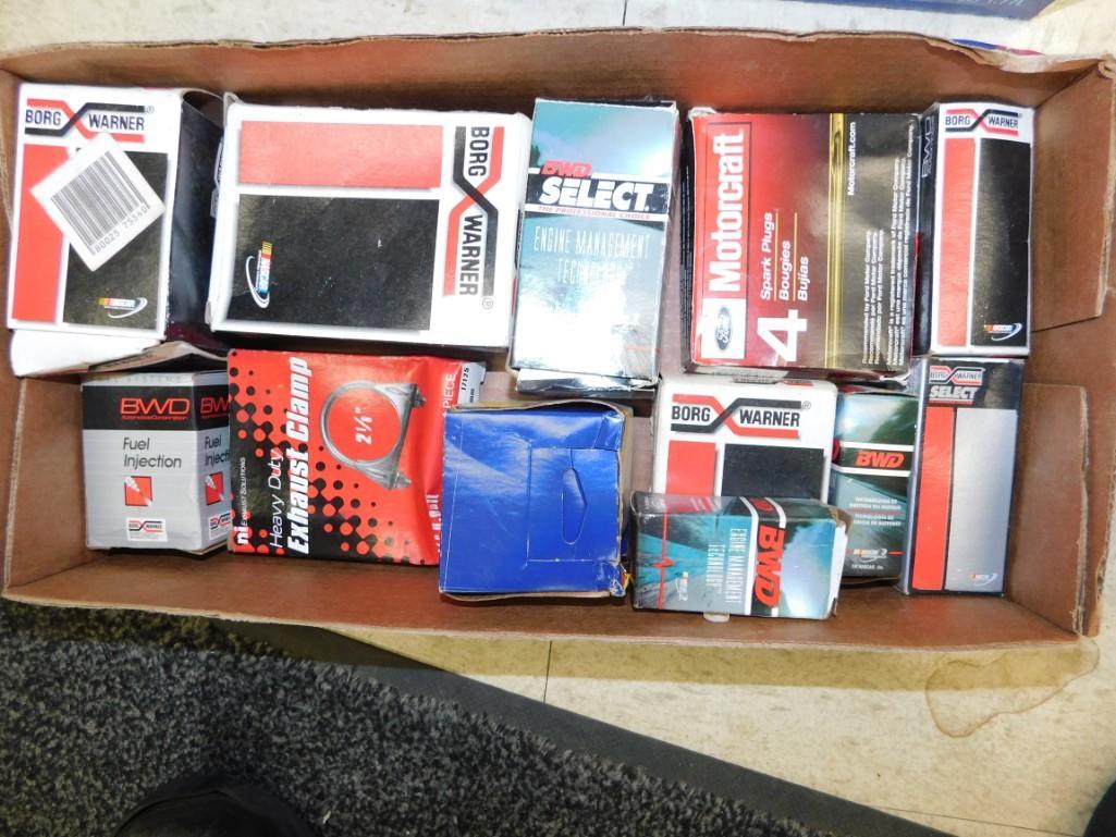 Large Lot of Misc. Car Parts Spark Plugs, Exhaust (1 of 1)