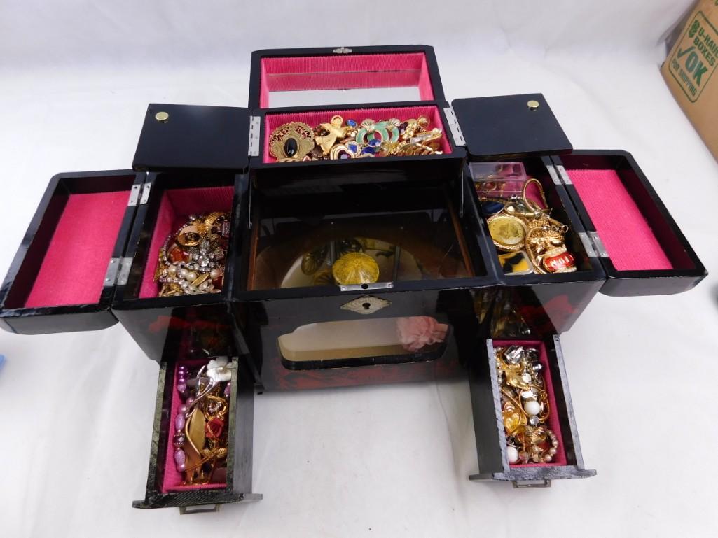 Jewelry Box Filled with Jewelry: Jewelry Box Filled with JewelryDimensions are roughly 8x13x5.5"Music box may not work, may need oiling.Some scratches and scuffs throughout, but not breaks or anything major.