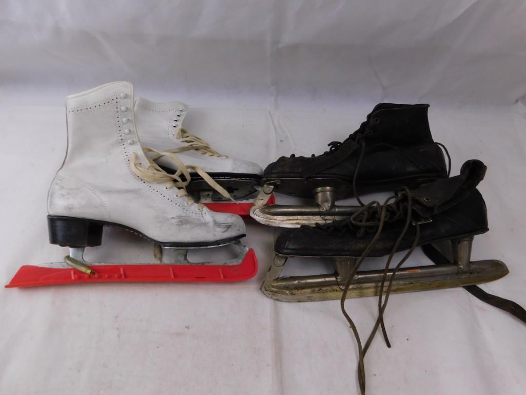 Two pairs of vintage ice skates: Two pairs of vintage ice skates The white pair looks like it's size 8 and the black pair doesn't seem to have writing, but in the last picture you can see they are probably about a couple of sizes lar