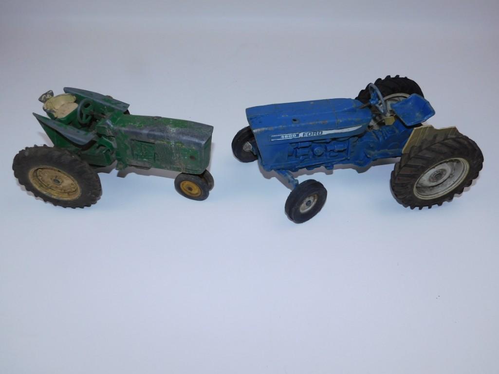 Lot of 2 vintage Toy Metal Tractors: Lot of 2 vintage Toy Metal Tractors One is Marked Ford 4600. See pictures, these are in rough shape
