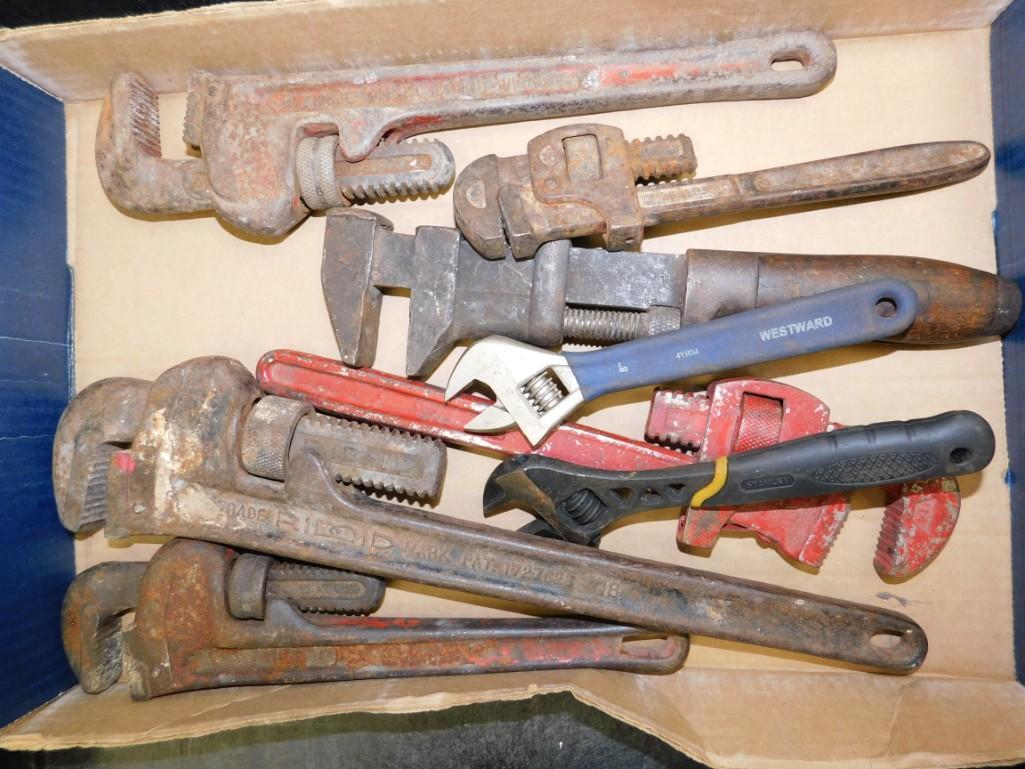Tool Lot of Pipe Wrenches: Lot of Pipe Wrenches - Assorted Sizes. It should have the one you need.