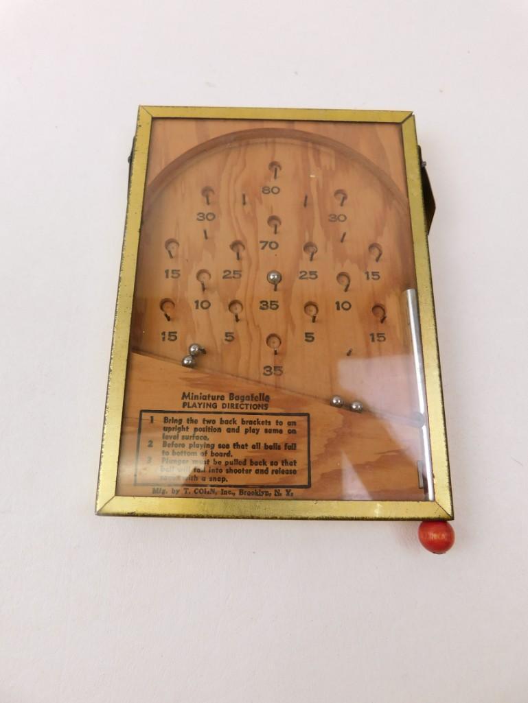 Vintage T. Cohn Miniature Bagatelle Wooden Pinball Game: T. Cohn Miniature Bagatelle Wooden Pinball Game When your internet goes and you're stuck with the stay at home order, you'll be glad you outbid everyone else on this game! 