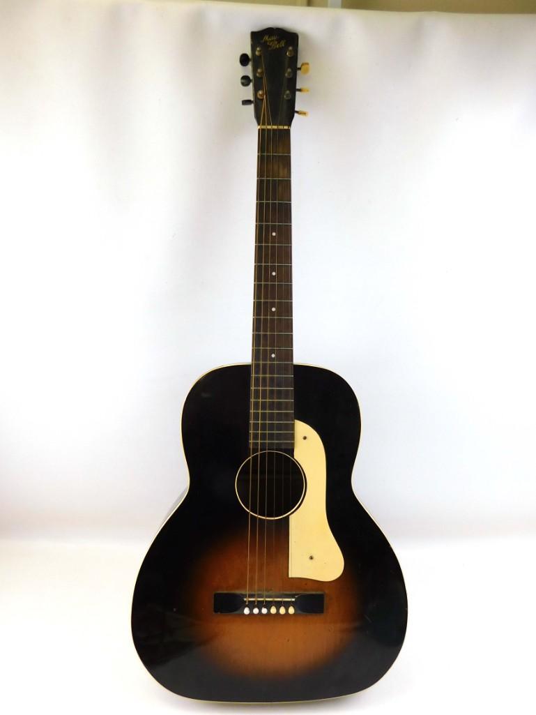 1930s Slingerland May Bell Hollow Body Acoustic Guitar: Slingerland MayBell Hollow Body Acoustic Guitar with Hard Case Condition: Has a crack on the side, case has string/rope to replace the handle, book is not complete, used strings