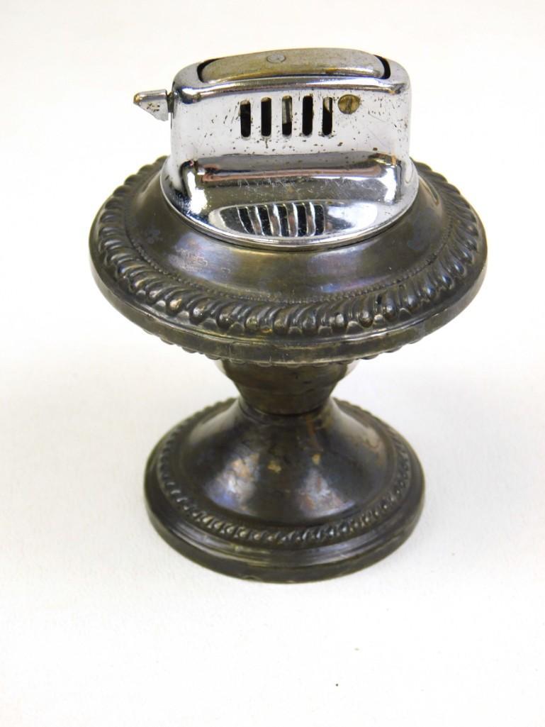 Sterling Silver Table Lighter: Sterling Silver Table Lighter . Obviously, the lighter insert is chrome, not silver, but the base/holder is sterling silver