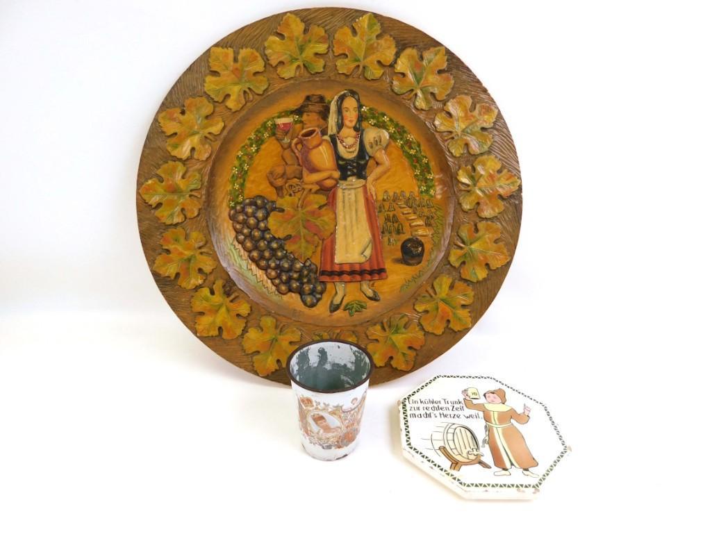 A collector plate, coaster and a cup: A collector plate, coaster and a cup
