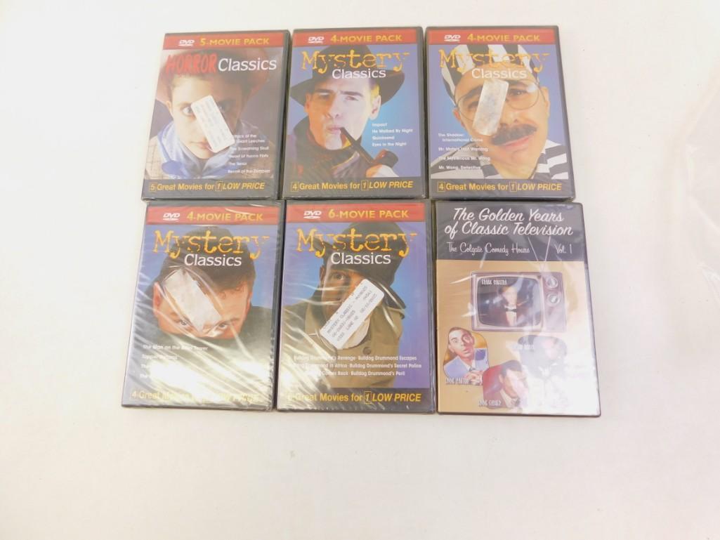 Lot of 6 DVD's with multiple movies on each New Sealed.: Lot of 6 DVD's with multiple movies on each New Sealed. Includes Horror Classics, Mystery Classics and the Golden Years of Classic Television The Man on the Eiffel Tower, Topper Returns, The Green Glo