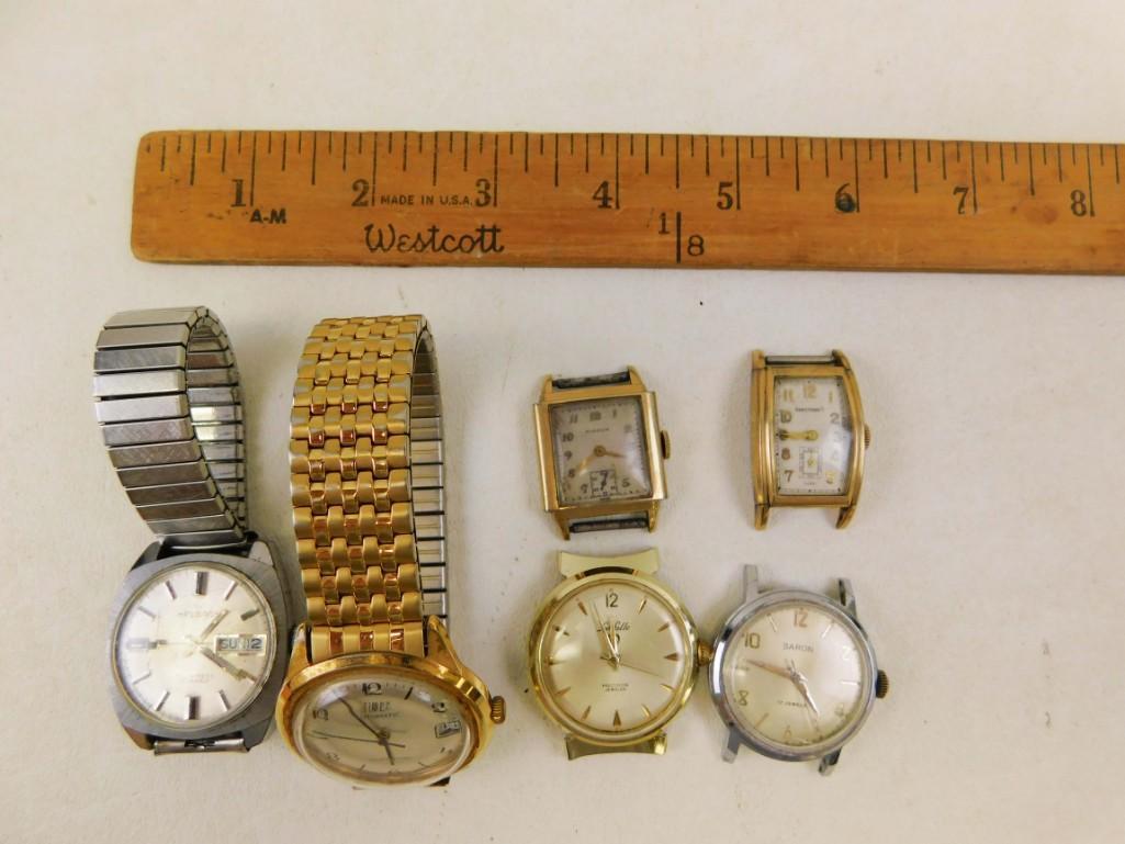 Lot of 6 watch faces and watches: Lot of 6 watch faces and watches Two have bands, the other 4 do not. These are either wind up or automatic and all of the seconds hands seem to move