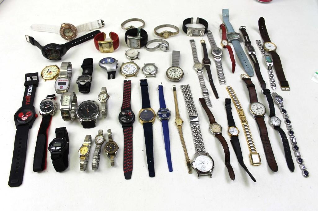 Lot of Watches: Lot of watches including Mickey Mouse , Michael Jordan , Amoco , Chicago Cubs , Indianapolis Colts , and more