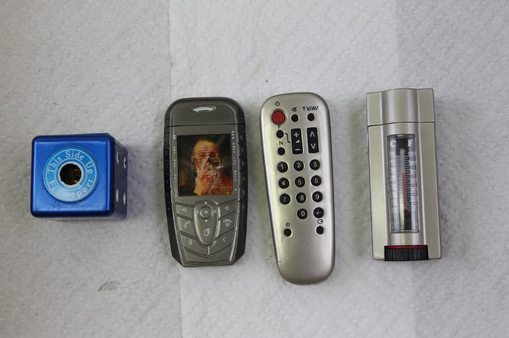 Lot of 4 Novelty Lighters: Lot of 4 Novelty Lighters Includes a die, a remote control, a thermometer and a cellphone. These only act as lighters and the other functions that they look like most likely do not work.