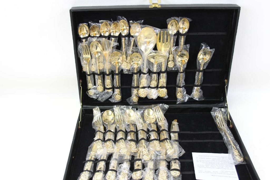35 pc Set of Golden Colored Flatware in a Box: 35 pc Set of Golden Colored Flatware in a Box . Rose design