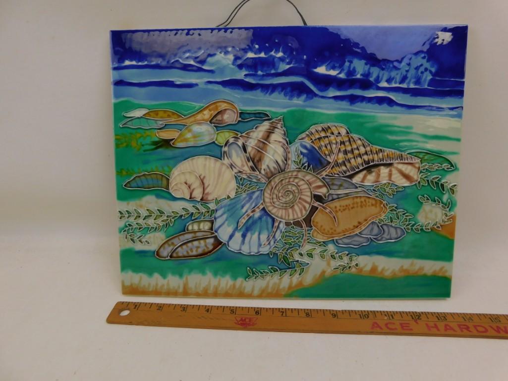 Ceramic Tile Seashell Wall Hanging Art: Ceramic Tile Seashell Wall Hanging Art This has a cork back. Roughly 14" long and a little less tall
