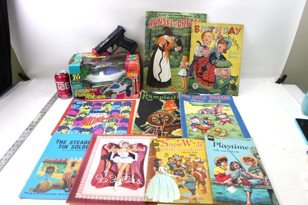 Misc Lot Toy Gun, Old Coloring Books, Monkees, Snow: Misc Lot Toy Gun, Old Coloring Books, Monkees, Snow White, Super Soaker Car, etc. I guess you pump the car and it goes!