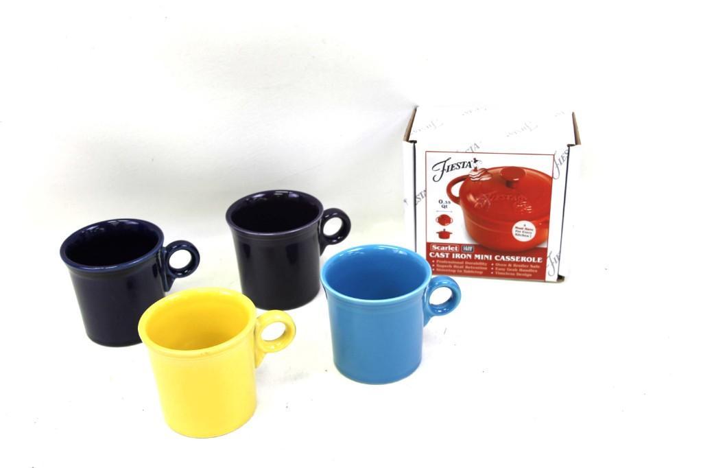 4 Fiestaware Mugs or Cups and a New Fiestaware Cast: 4 Fiesta ware Mugs or Cups and a New in Box Fiestaware Cast Iron Mini Casserole