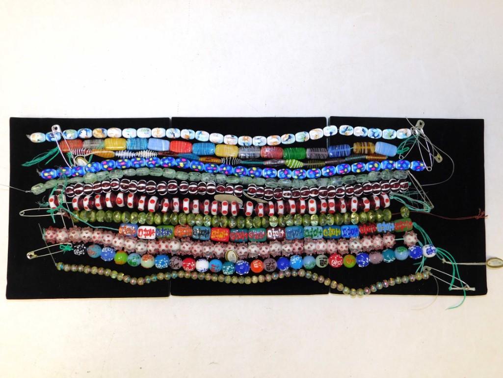 Lot of Jewelry / Art Glass Beads on strings: Lot of Jewelry / Art Glass Beads on strings 12 different sets. Make lots of cool bracelets and/or necklaces with these. Tray not included