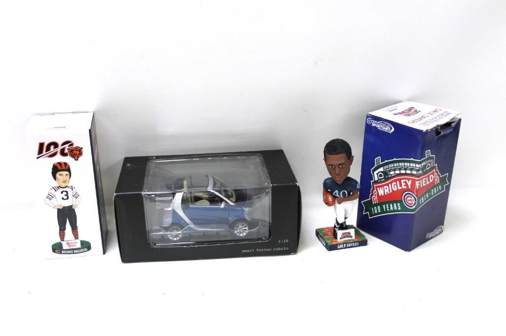 Bronko Nagurski and Gale Sayers Figurines and Smart: Bronko Nagurski and Gale Sayers Bobble Head Figurines and Smart fortwo cabrio Car