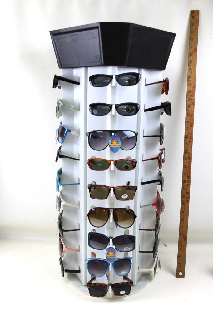 Rack with Sunglasses: Rack with sunglasses . Includes the rack and all of the sunglasses that are pictured. NOTE: If you do not want the rack, please let us know that. Otherwise, it will be automatically 